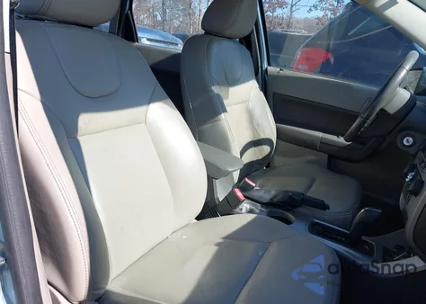 2009 Ford Focus Sel z USA, uszkodzony, nr VIN 1FAHP37N09W210938